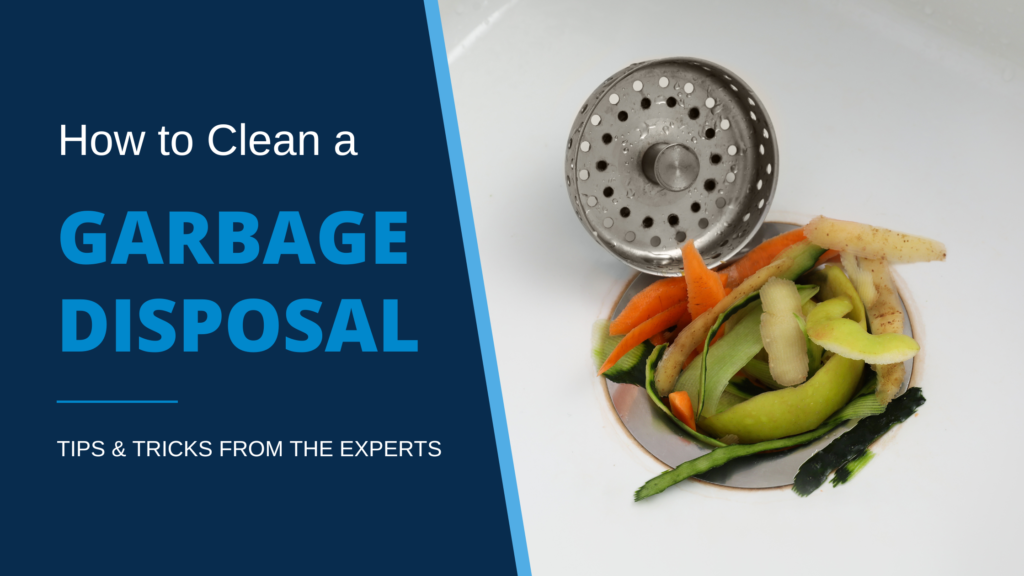 Illustrating blog post “How to Clean a Garbage Disposal” is a photo of a white kitchen sink with a silver drain clogged with orange carrot peels, brown potato peels, and green cucumber peels.